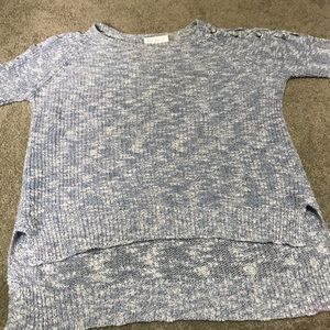 heather blue sweater. lacing on shoulders.